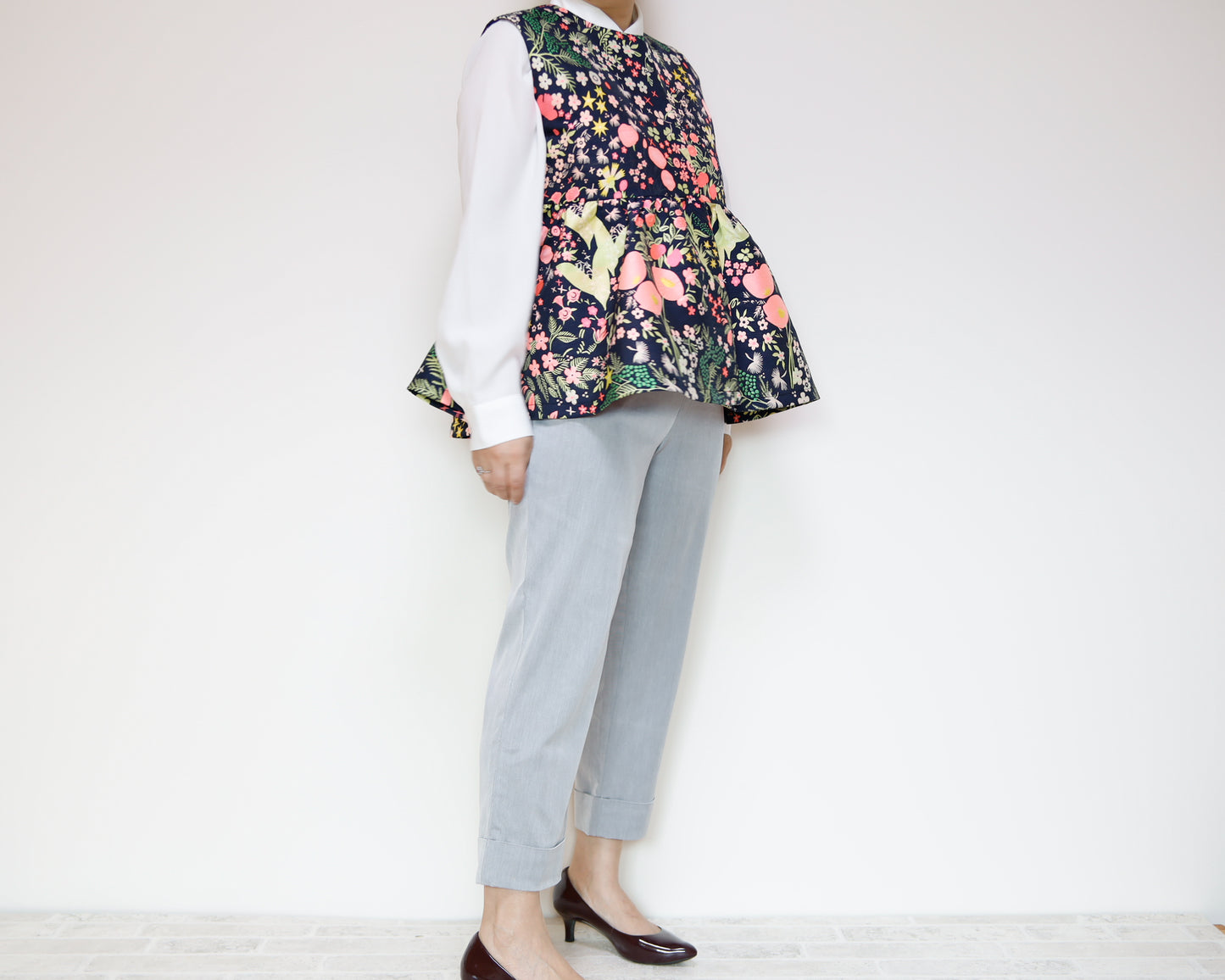 <V02A> PEPLUM VEST