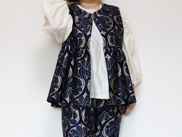 <V02CG> PEPLUM VEST