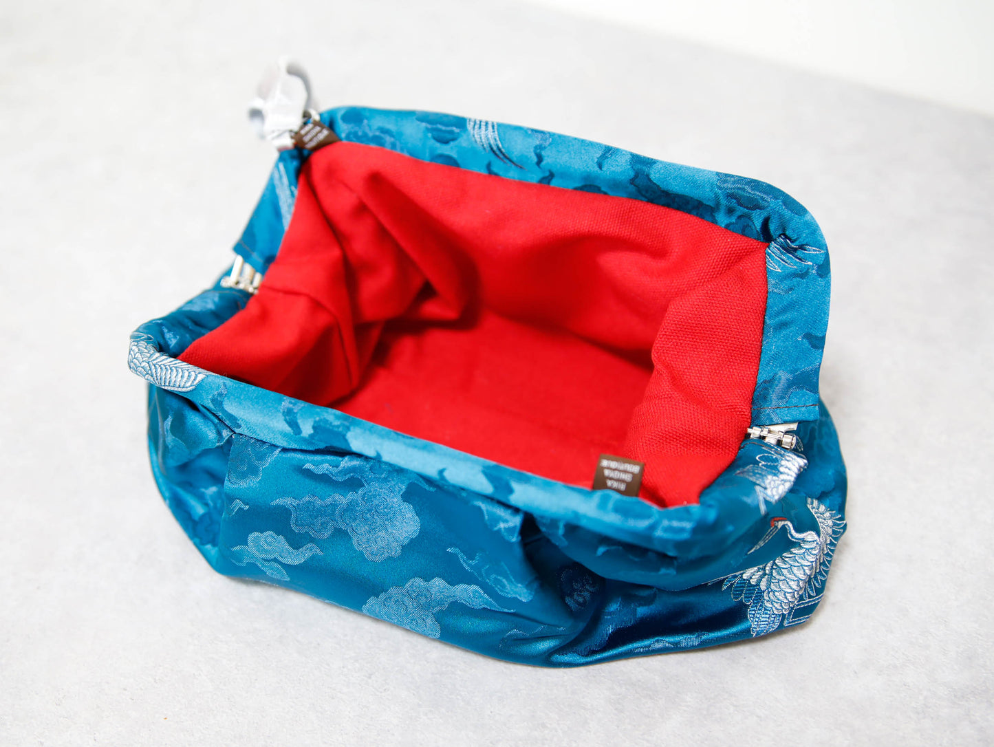 <B10CC> DIM SUM CLUTCH BAG  CYAN WITH CRANE